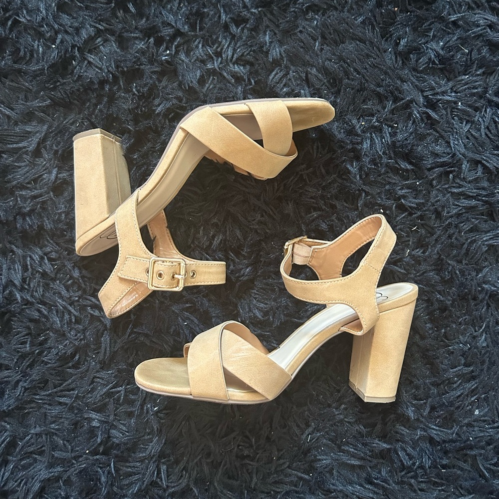 Women’s size 9; 4 in tan chunky heel; They were purchased form the store “Q”
